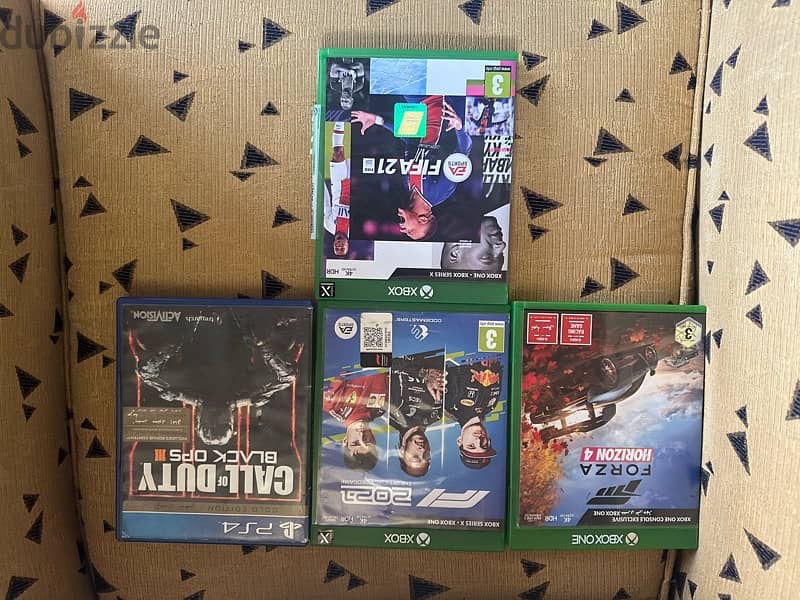 xbox one like new , 3 cds , adapter , HDMI cable , no controller , 2