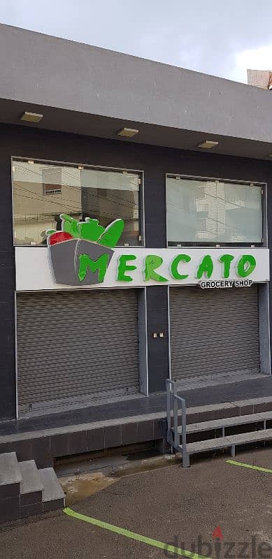 Mercato Sign