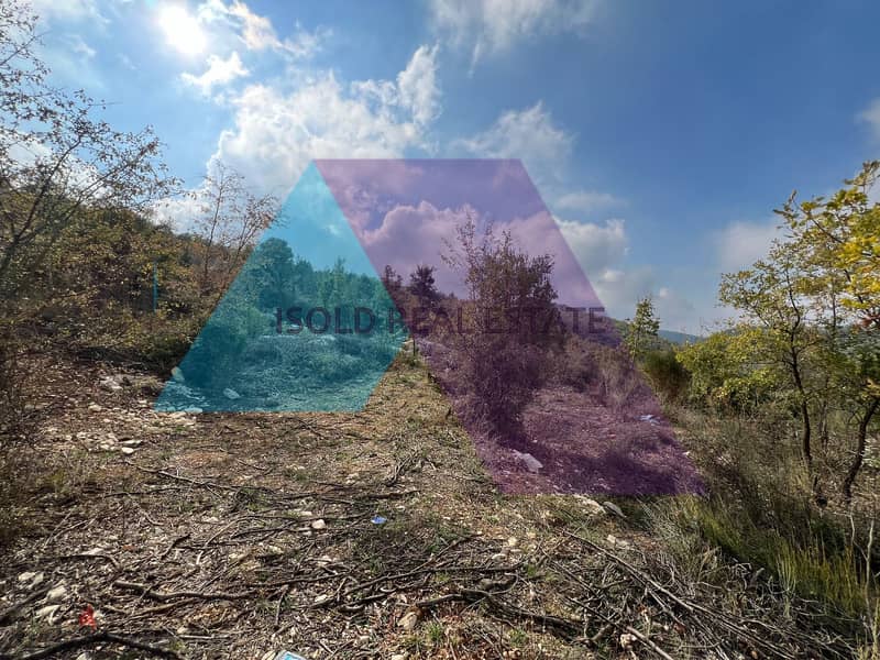 A 1152m2 land having an open mountain view for sale in Mechmech|Jbeil 1