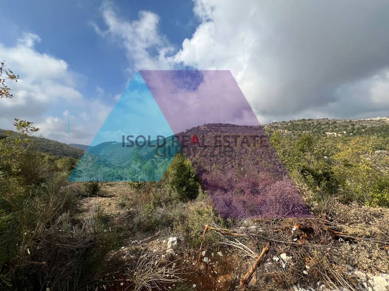 A 1152m2 land having an open mountain view for sale in Mechmech|Jbeil 4