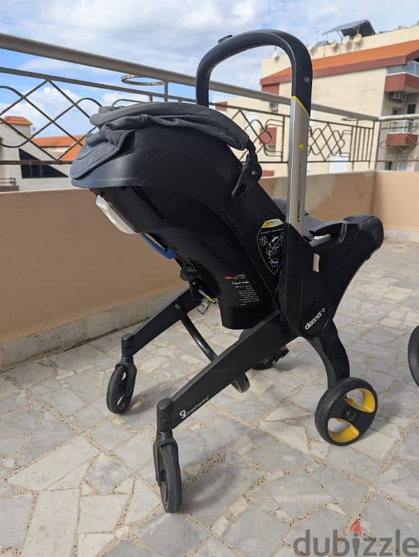 DOONA Stroller and Car Seat with Base 1