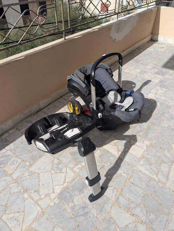 DOONA Stroller and Car Seat with Base 8