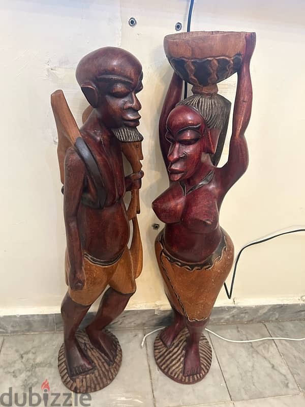 Wooden statues of a Man, Woman, Tiger and Gazelle 1