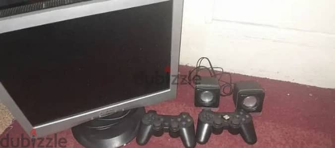 Clean computer screen with computer speakers and USB controller