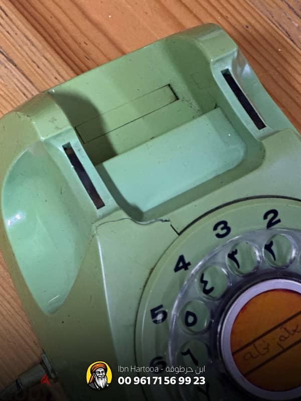 Old rotary dial phone, Arabic-English dual language 1