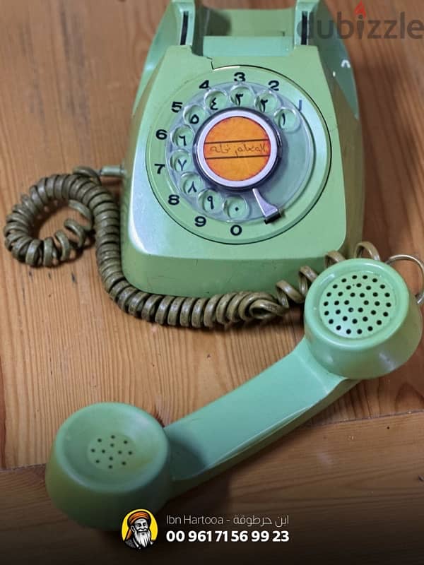 Old rotary dial phone, Arabic-English dual language 2