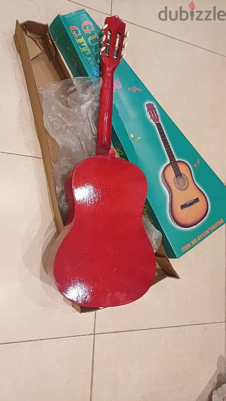 guitar 3/4  new in box 1