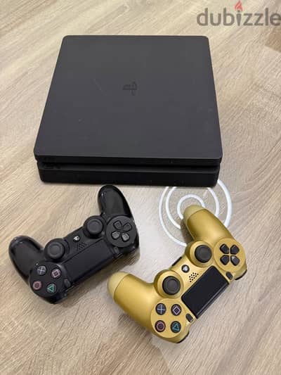 Ps4 slim 500GB + 2 controller  (used Like new)