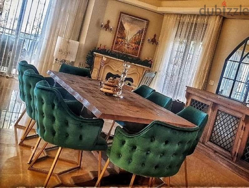 dining table with 8 velvet and iron chairs 0