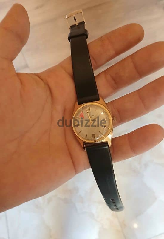 gold automatic swiss watch / ساعة 1