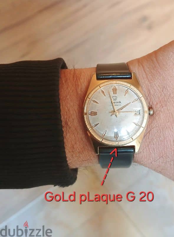 gold automatic swiss watch / ساعة 4