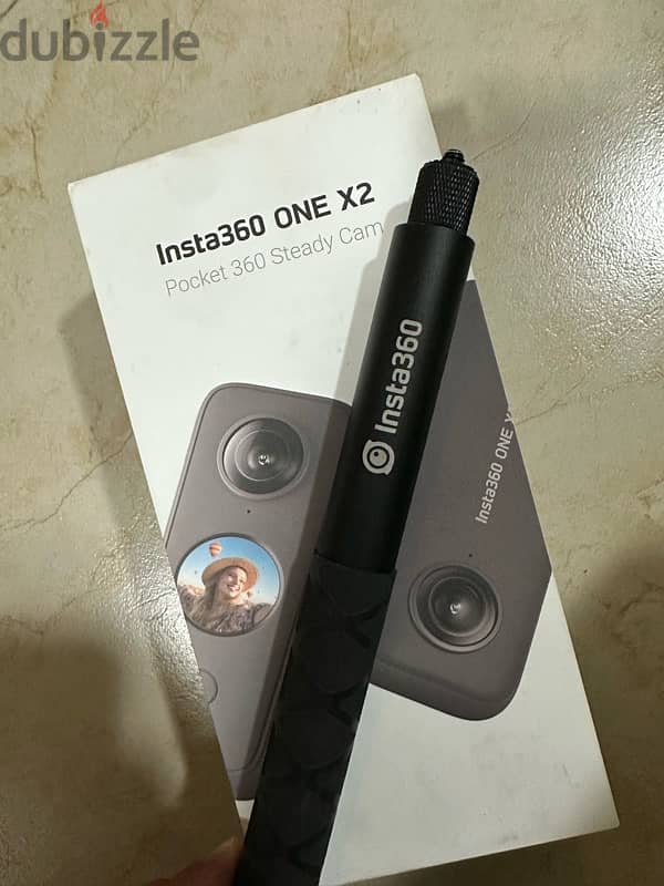 insta 360 one x2 with disappearing selfie stick in perfect condition 0