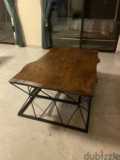 coffee table with natural wood and metal legs