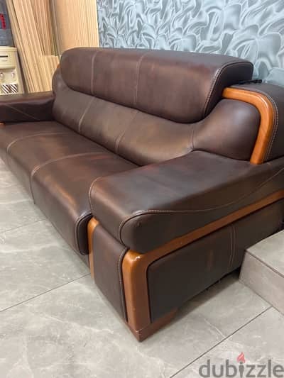 2 sofas leather and wood