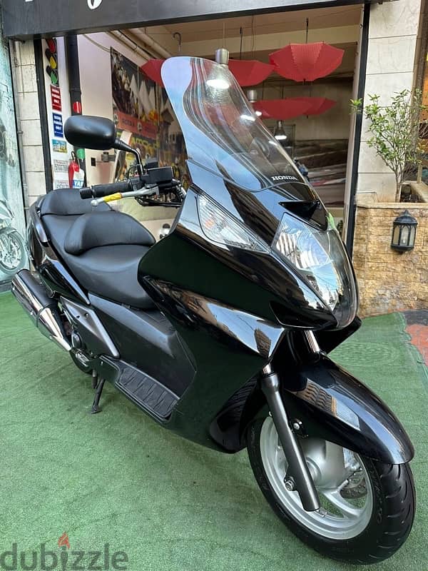 Honda silverwing 400 cc Tmode معرض صك بيع 0