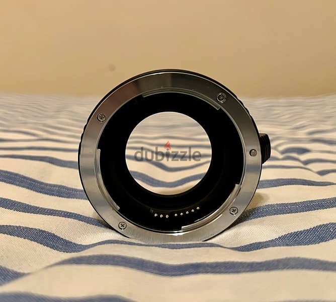 Canon EF12 II extension tube. 3