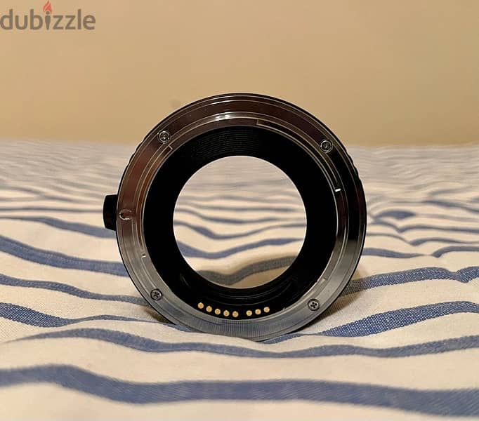 Canon EF12 II extension tube. 4