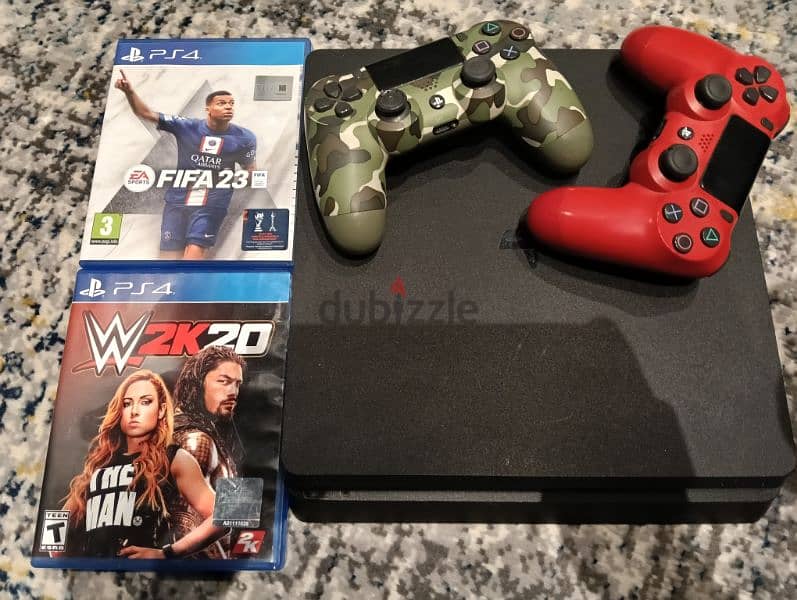 PS4 slim used good condition with 2 controllers 0