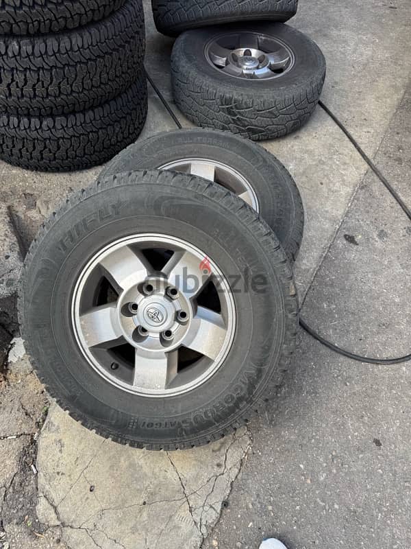 4 rims + tires for sale 0