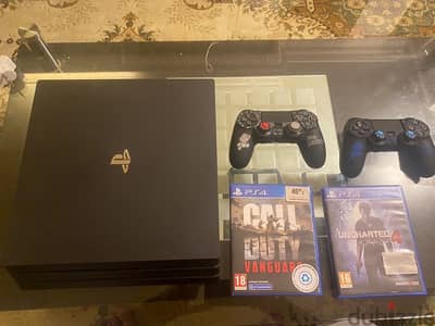 PS4 Pro barely used with 2 games and 2 controllers