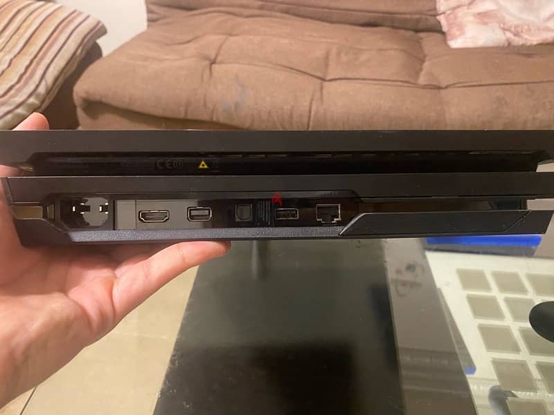 PS4 Pro barely used with 2 games and 2 controllers 1