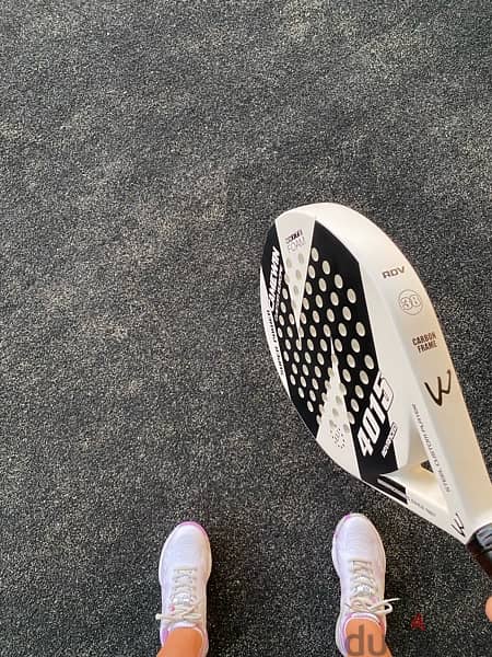 used like new racket + cover 1