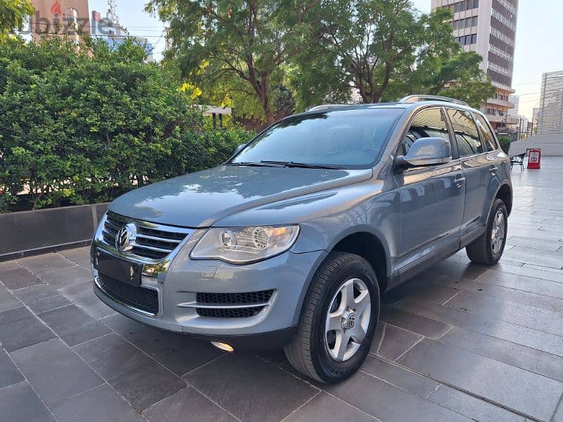 Volkswagen Touareg V6 Model 2009 مصدر الشركة 0