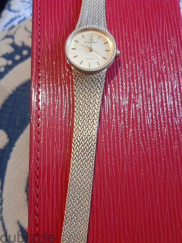 Golden pearl watch 2