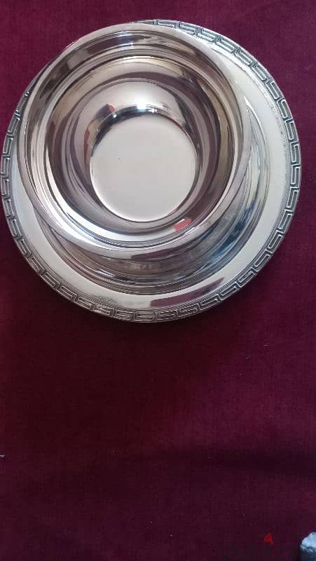 silver cups with their plates 0