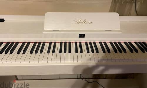 white belton piano