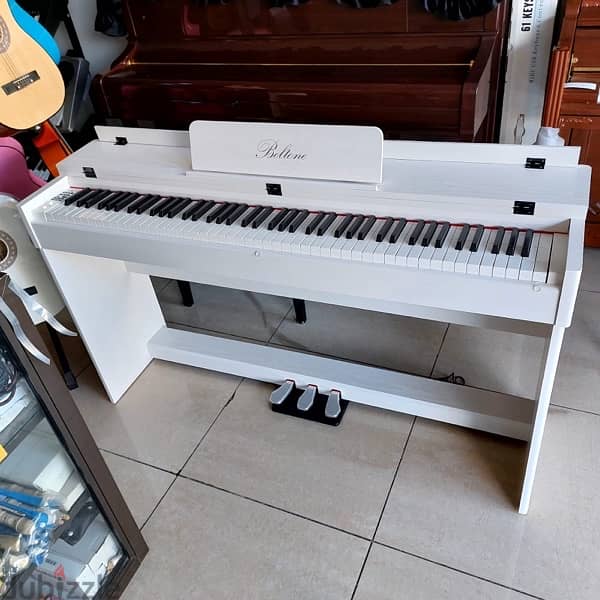 white belton piano 1