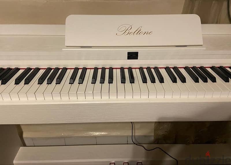 white belton piano 3