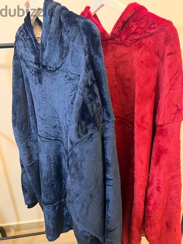 Cozy One-Size Hoodie Blankets in Red, Blue, and Grey. 0