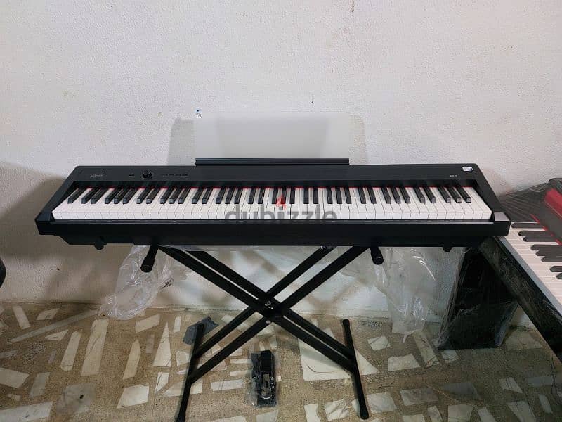 New portable piano 0