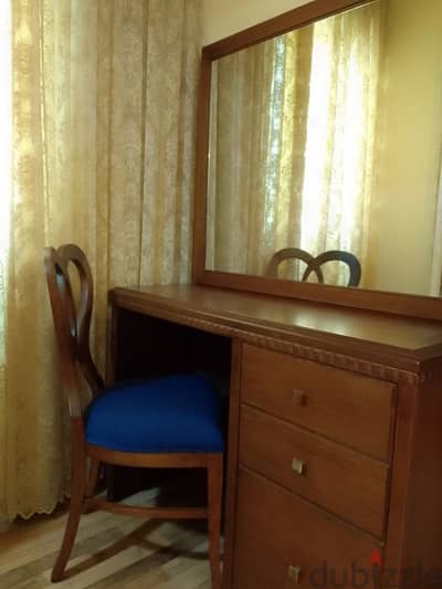 commode with mirror and chair