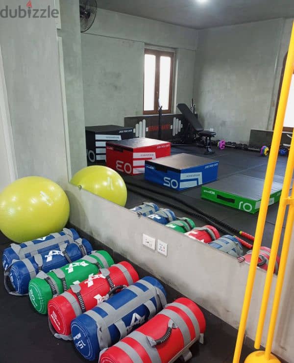 dumbles and all equipments for a small gym 4