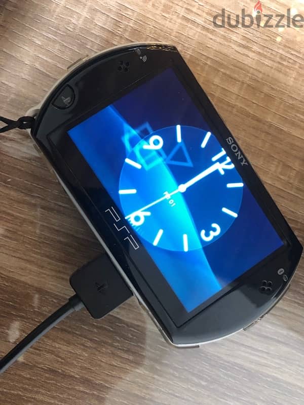 PSP Go + accessories (playstation portable go) 0