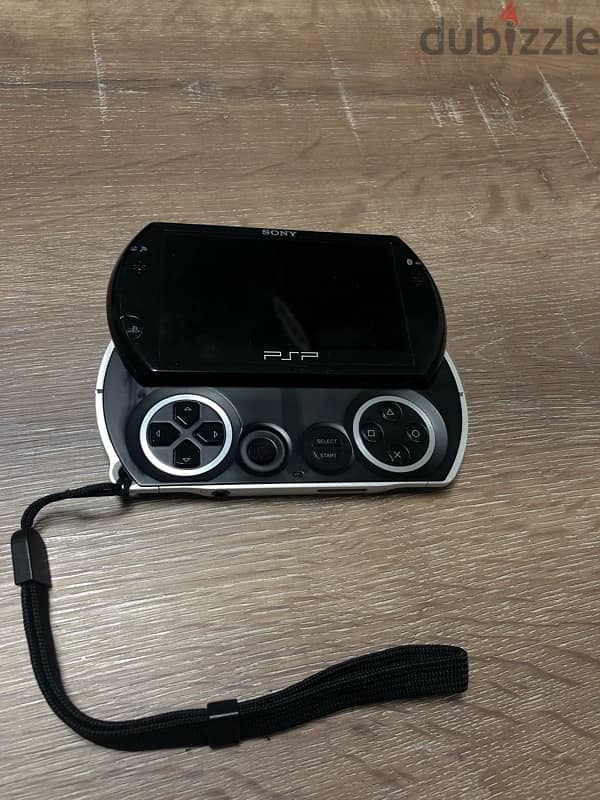 PSP Go + accessories (playstation portable go) 2