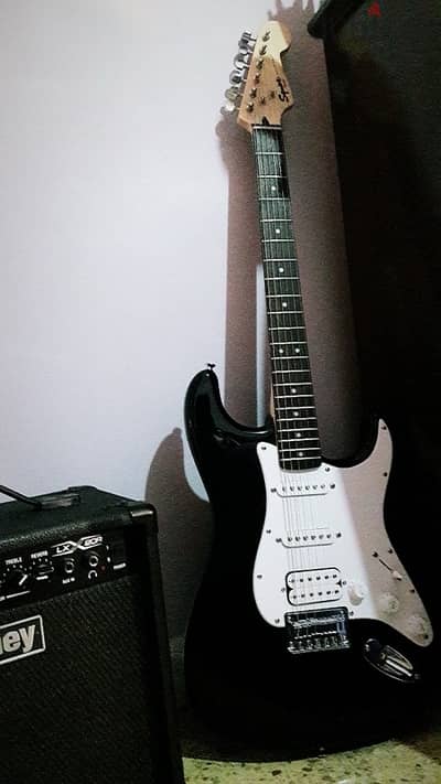 Guitar + Amplifier