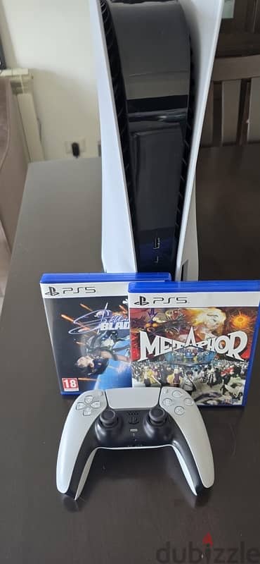 Playstation 5 + 2 games 0