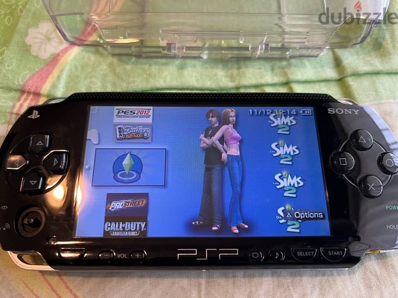 PSP  + COVER + CHARGER + GAMES 17