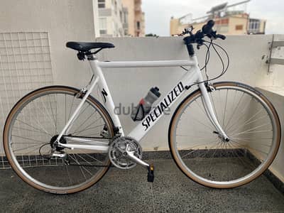 specialized hybrid bike with accessories and spare parts