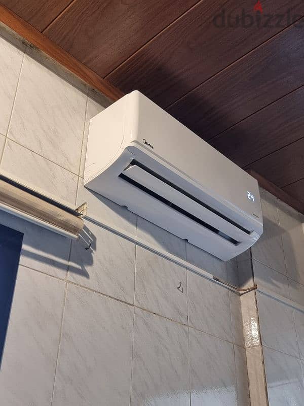 Air conditioner, hot and cold Midea original inverter 2