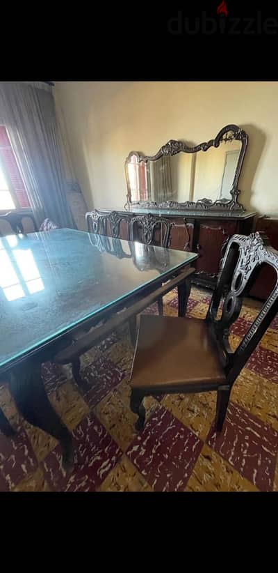 Old dining table with chairs and mirror table