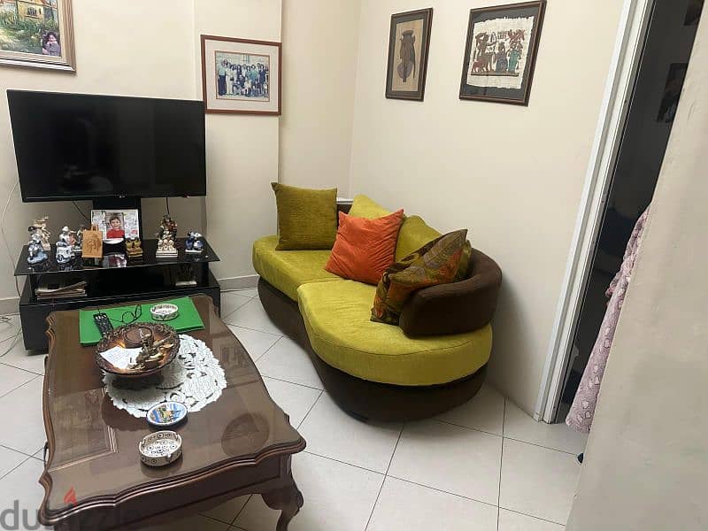 living room in a very good condition with curtains غرفة جلوس sioufi 7