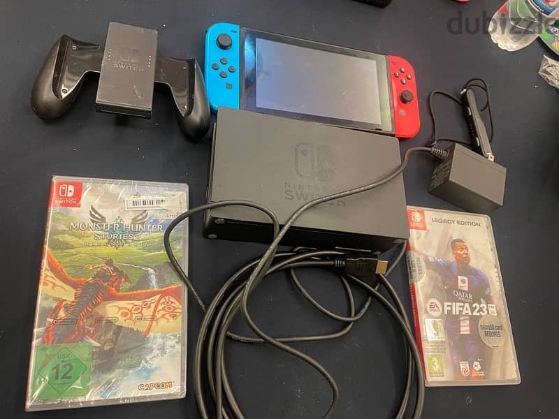 nintendo switch with brand new 2 games 0