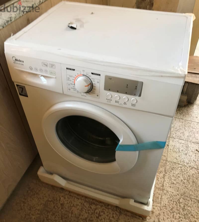 Midea Washing Machine: MFE70-S1206 0