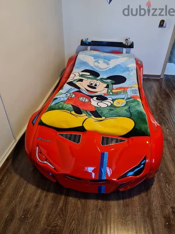 kids car bedroom with mattress and curtains 2