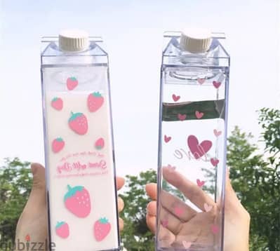 transparent milk and juice bottles