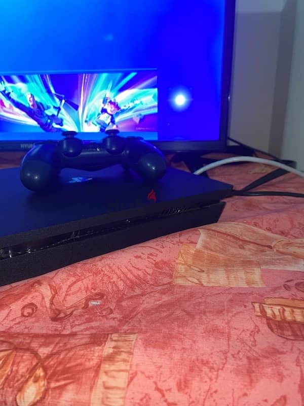 PS4 + CONTROLLER + 6 GAMES 1